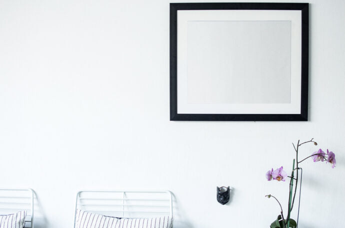 Generate Mockups of Black Picture Frames on Walls