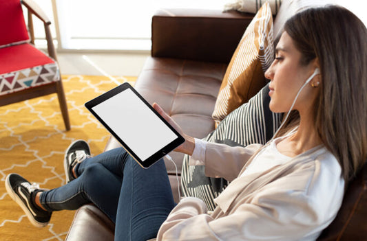 Generate a Mockup of a Woman Reading on an iPad