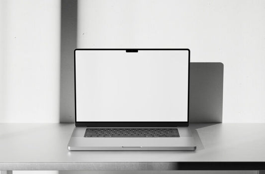 Mockup of MacBook on an Industrial Table