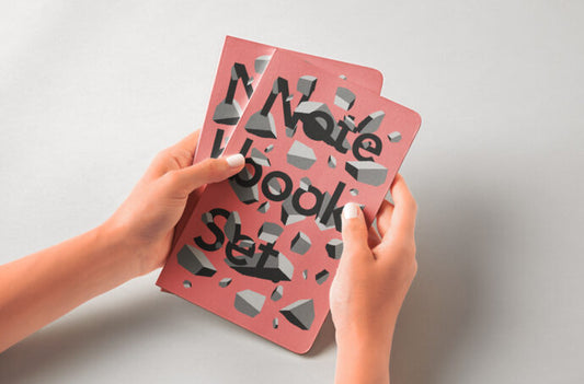 Mockup of Notebooks being held by Hands