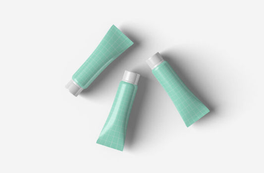 Mockup of Three Cosmetic Tubes