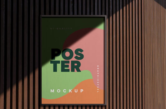 Mockup of a Framed Poster on a Wooden Wall