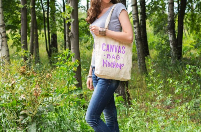 Mockup of a Girl Holding a Cloth Bag