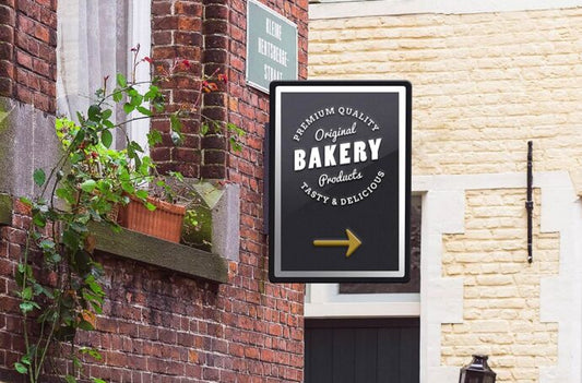 Mockup of a Wall-Mounted Sign for Public Display