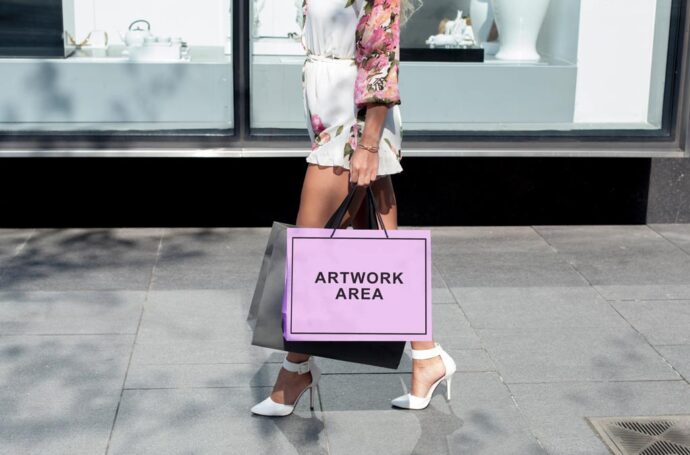 Mockup of a Woman Holding a Shopping Bag