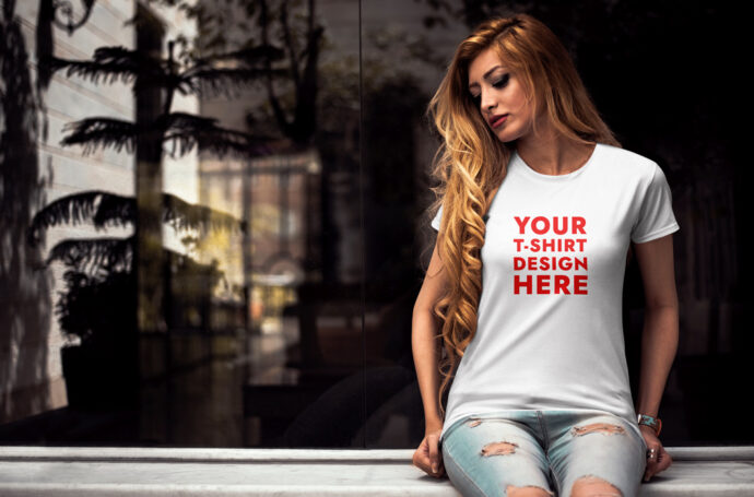 Mockup of a Woman Sitting and Wearing a T-Shirt