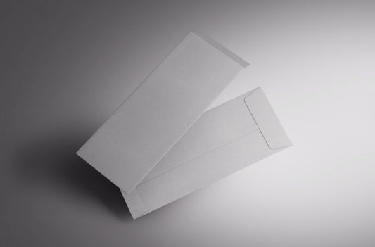 Mockup of two slim, floating envelopes