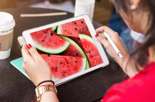 Woman viewing iPad Mockup